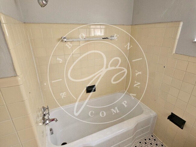 Building Photo - "Charming 2 Bedroom Rental with Hardwood F...