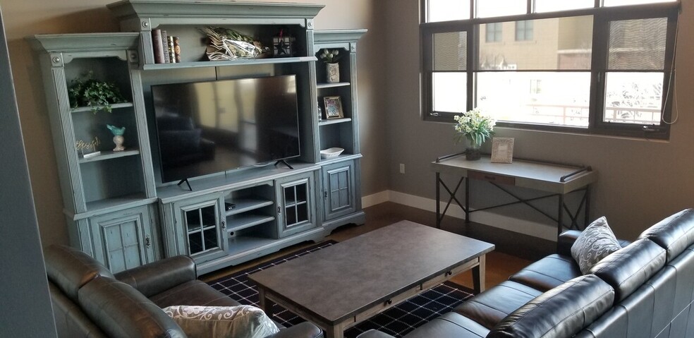 Living Room. Leather Sofa & Loveseat - 3066 S Bown Way