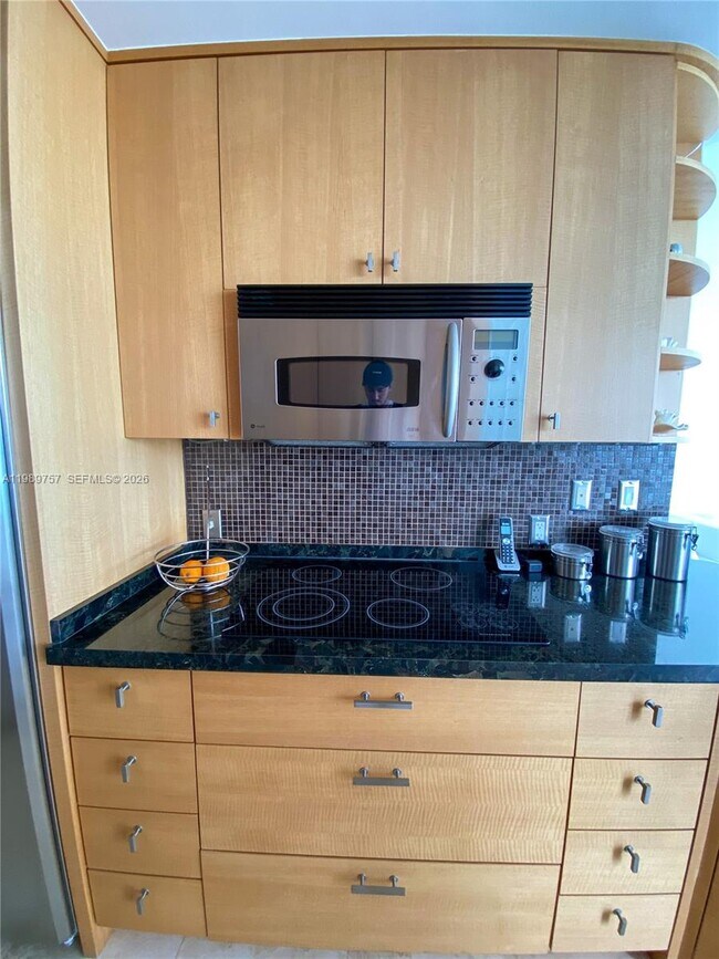 Building Photo - 6301 Collins Ave