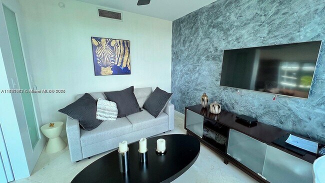 Building Photo - 9401 Collins Ave