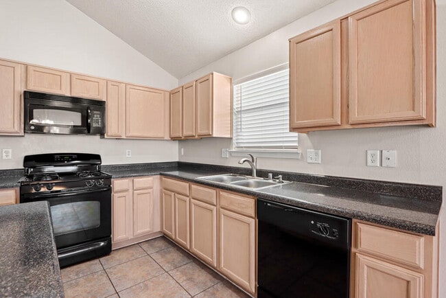 Building Photo - 5432 Santiago Roque Dr