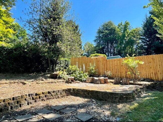 Building Photo - Updated Ranch with Large Fenced Yard, Tucked Off Walker Road~ Gas Fireplace~ Great Natural Light~...