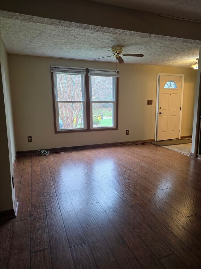 Building Photo - Serene Living in a Quiet Lakeside Community