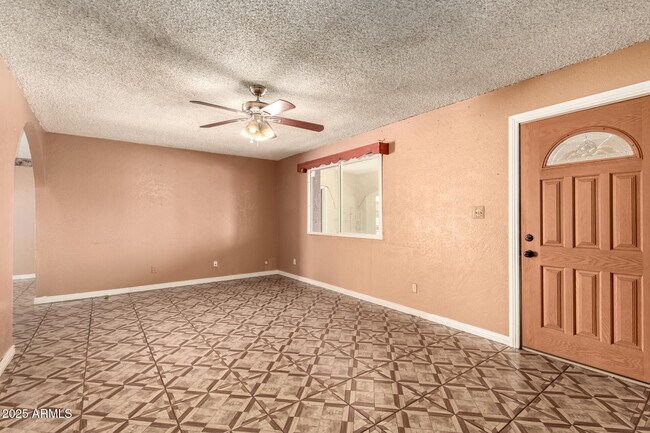 Building Photo - 3316 N 63rd Ave