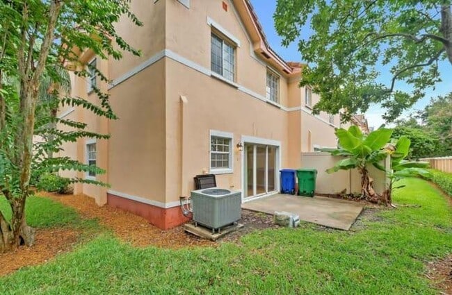 Building Photo - 8678 SW 23rd Ct