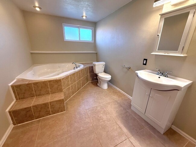 Building Photo - Updated 3 bedroom 2 bath with central air