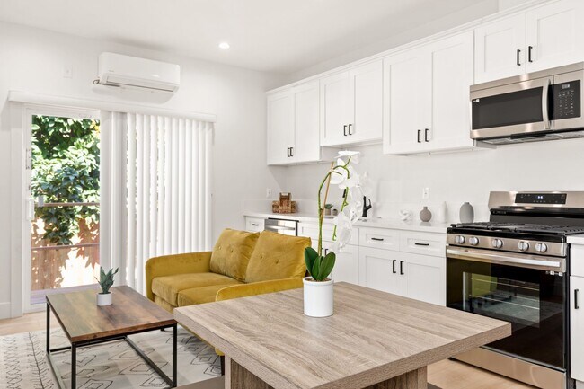 Building Photo - A 3 Bedroom apartment with ensuite bathrooms, common areas and a fully functional kitchen at 1736...