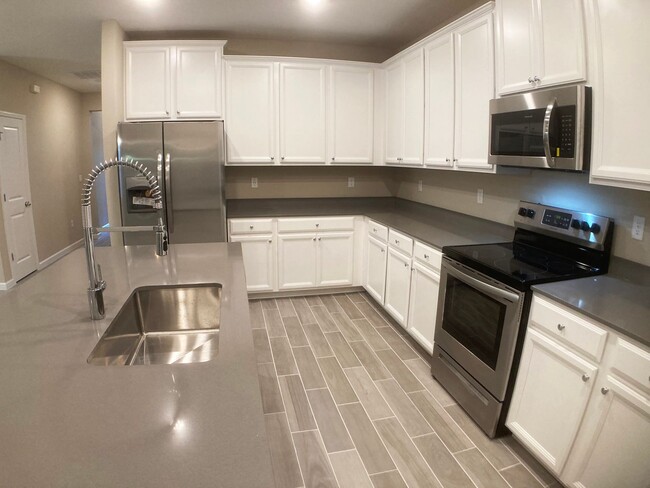 Building Photo - Your Private Escape with High-End Finishes...