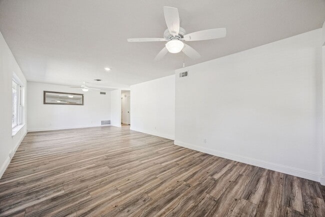 Building Photo - Stylish Renovation + Solar Savings in Prime Location