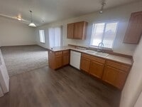 Building Photo - Newer Carpet, flooring & paint! 3 Bedroom 2 Bath with 2 car attached garage.