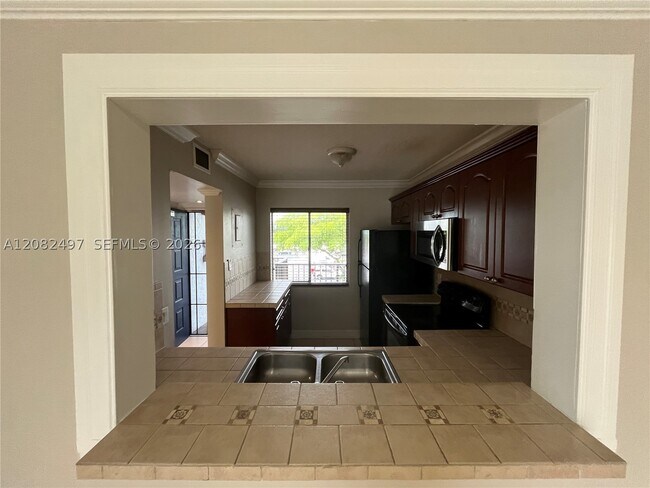 Building Photo - 8560 N Sherman Cir