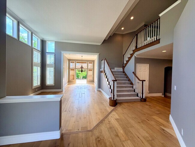 Building Photo - Elegant Mediterranean Living with Private Pergola Garden & Resort Amenities