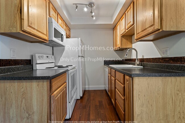 Building Photo - One Bedroom Condo In Mt. Park with Mt Park Rec Center Access!