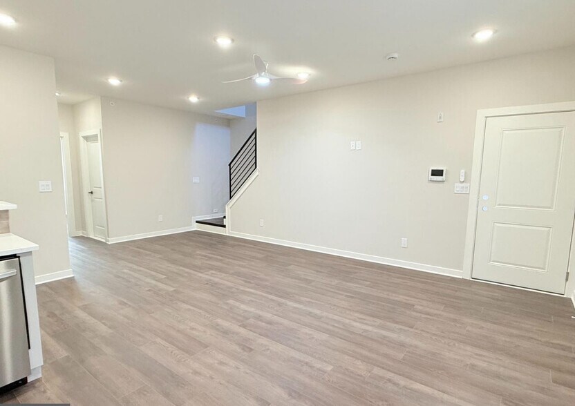 Living Room (with stairway to rooftop) - 2511 Manton St