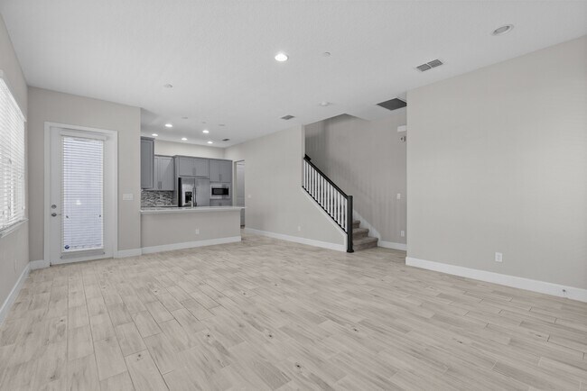 Building Photo - Move In Ready End Unit Townhome in Laureate Park | 3 Bed | Tesla Charger