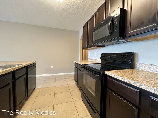 Building Photo - 4 br, 2 bath House - 1665 Laurel Oaks Dr