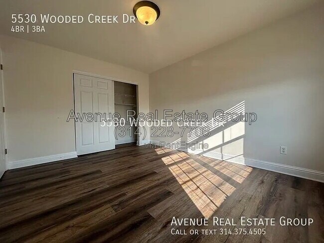 Building Photo - 5530 Wooded Creek Dr