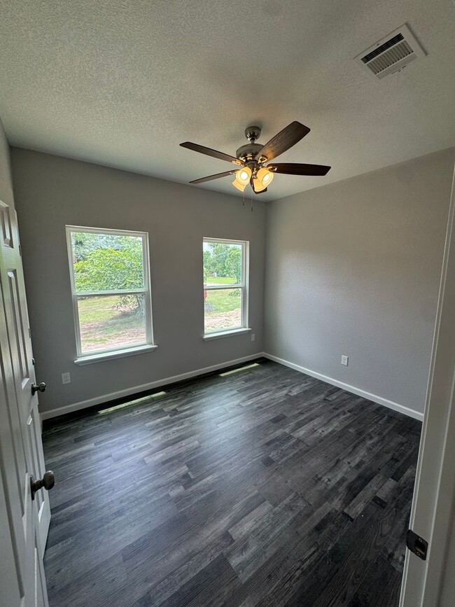 Building Photo - 3/2/2 NEW CONSTRUCTION Spacious YARD WITH ...