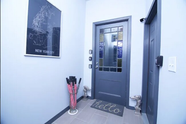 Entrance to stairwell to access apartment - 25 Reed St