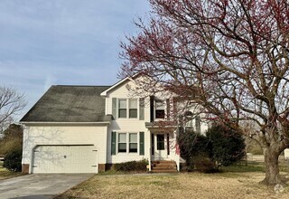 Building Photo - An adorable home! Pets Welcome!