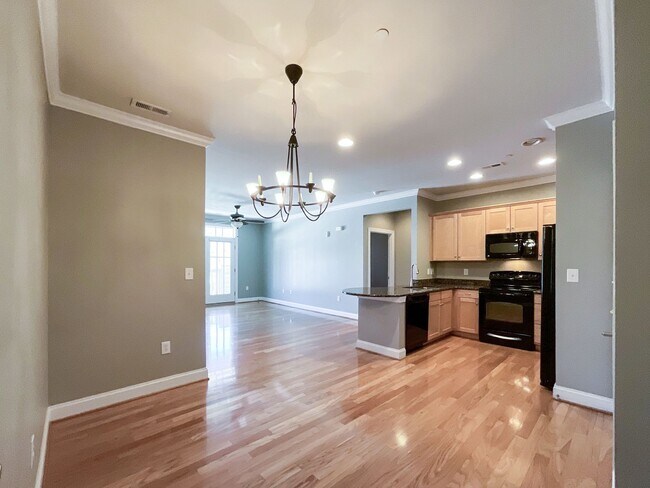 Building Photo - COMING SOON! Charlotte Living at Its Best! 2BR/2BA End Unit + Chef’s Kitchen & Water Included!
