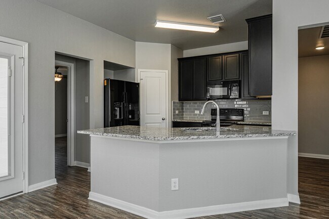 Building Photo - Live, love, and grow in this charming home!