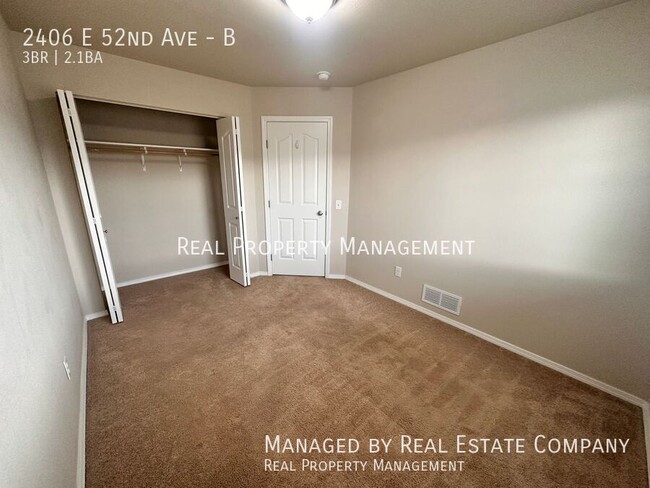 Building Photo - 2406 E 52nd Ave