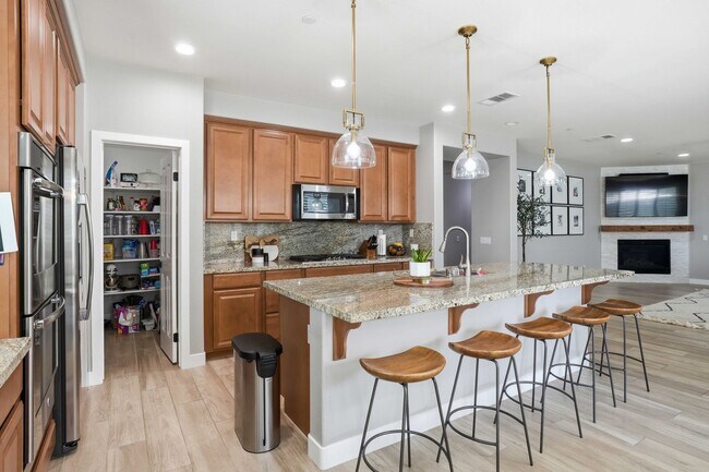 Building Photo - Highly Sought-After Next Gen Home with Private Downstairs Suite in Gated Valencia Community