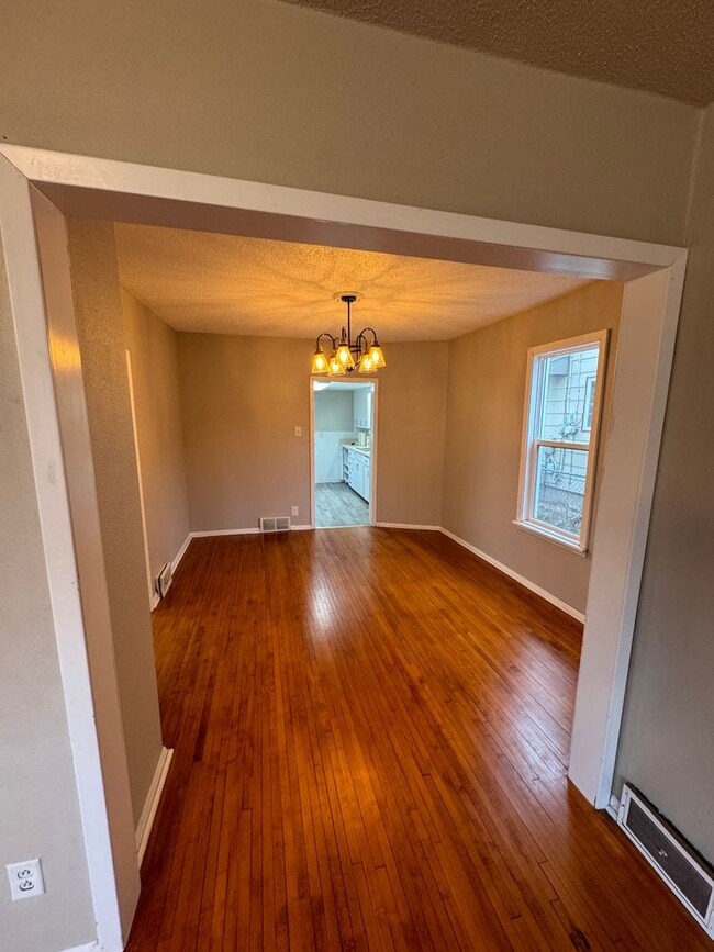 Building Photo - Stylishly Renovated Charming Home on 215 7...