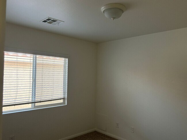 Building Photo - New flooring and freshly painted 4 bedroom home