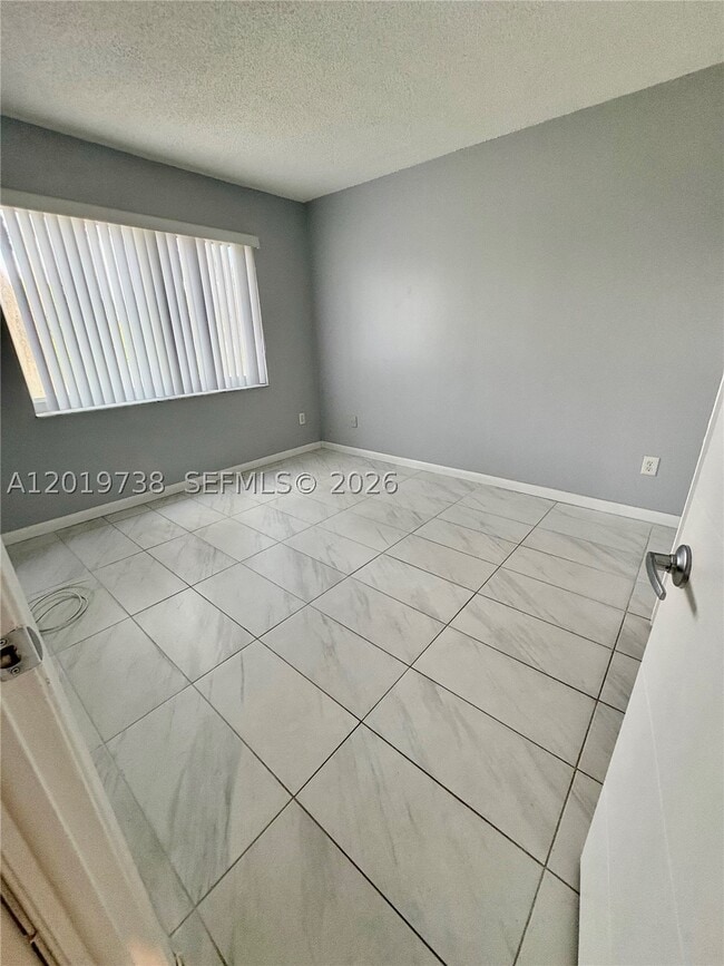 Building Photo - 7815 Camino Real I-216