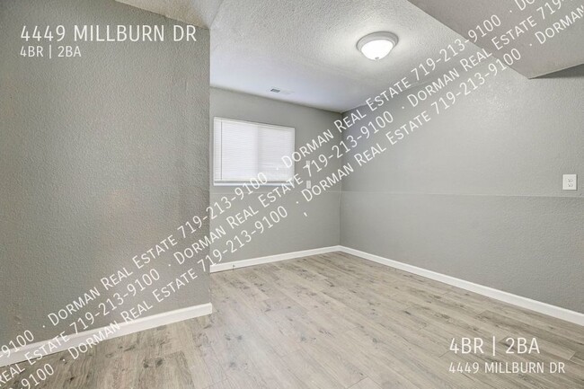 Building Photo - Four bedroom home close to Ft. Carson, Lar...