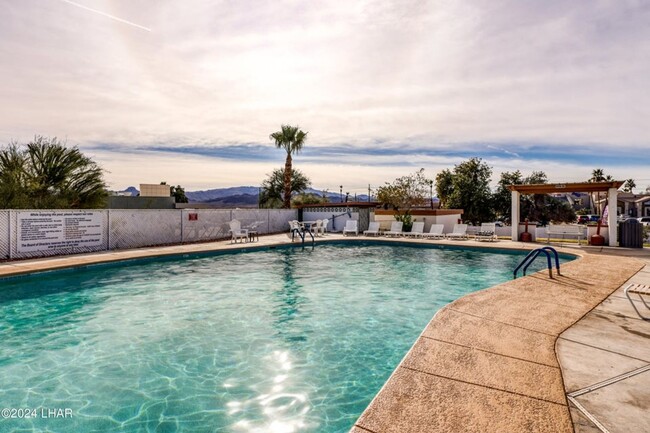 Building Photo - Beautiful updated condo in Los Lagos Upstairs unit. Available March 15 to Dec 31st 2026