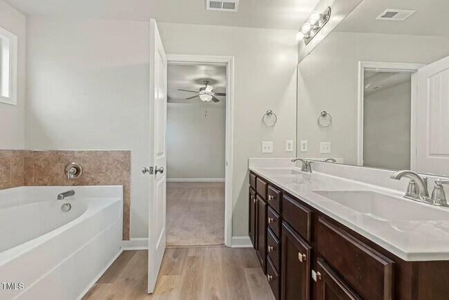 Building Photo - Earn Wealth While Leasing - Like a Homeown...