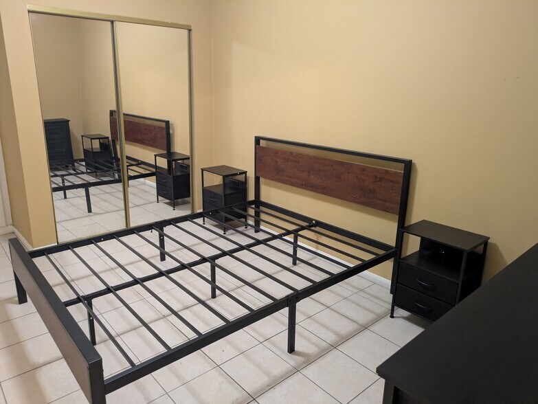 Queen Bedframe/2 night stands - 1125 N Gage Ave
