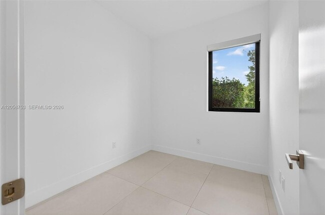 Building Photo - 16709 Botaniko Dr N