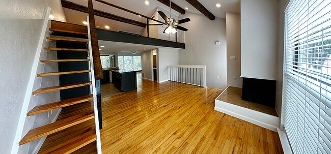 Stairs lead to the loft - 6724 Eastridge Dr