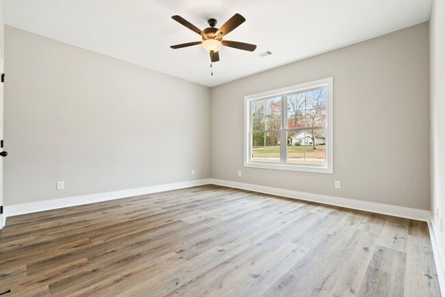 Building Photo - Available now! New Spacious 3 br 2.5 Ba with private 2 car garage, covered patio and fenced in ba...