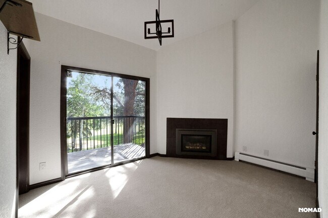 Building Photo - Spacious 4BR Condo in Evergreen