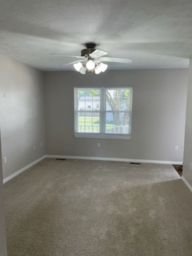 Building Photo - Immaculate Three Bedroom Two and Half Two-Story Charmer