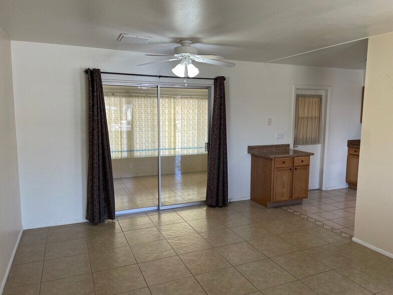 Dining room patio door to AZ room - 11044 W Sun City Blvd
