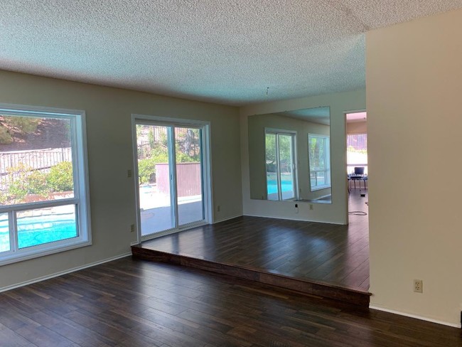 Dining Room with back yard access. Vertical blinds added since photo - 2571 Cordelia Rd