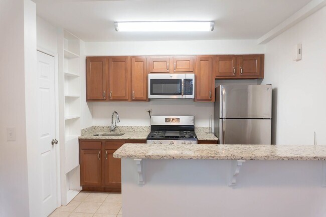Building Photo - Charming 2BR Home in Lily Ponds NE DC – Ac...