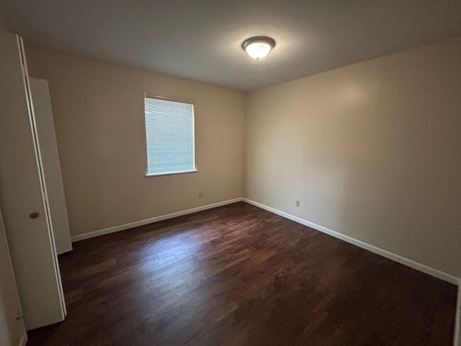 Building Photo - Beautiful Corner Lot Living