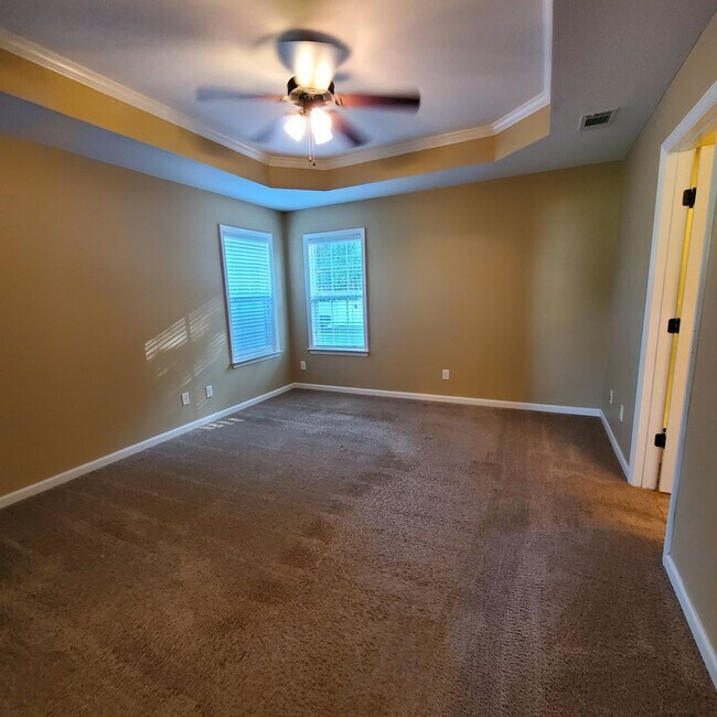 Building Photo - Welcome to Serene Living: Spacious Home on a .61 Acre Lot near Moody Airforce Base