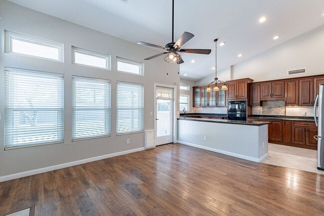 Building Photo - Charming 4-Bedroom Home with Luxurious Poo...
