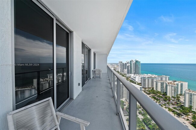 Building Photo - 4010 S Ocean Dr