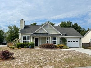 Building Photo - 3 bedroom/2 bathroom home with one-car gar...