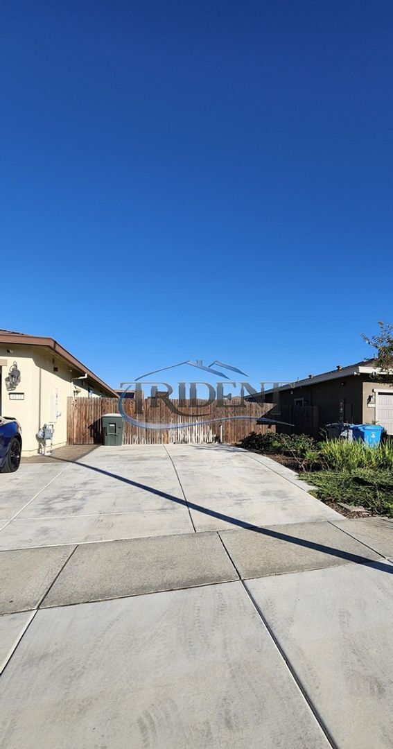 Building Photo - Updated home with a built in BBQ and play area