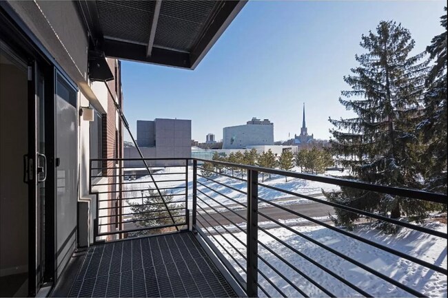 Building Photo - 1Bd/1Ba with Heated Parking, Stainless Steel Appliances, and Pool Access
